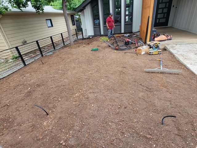 Irrigation — Sprinkler lines roughed in and pressure-checked before a blade of grass.
